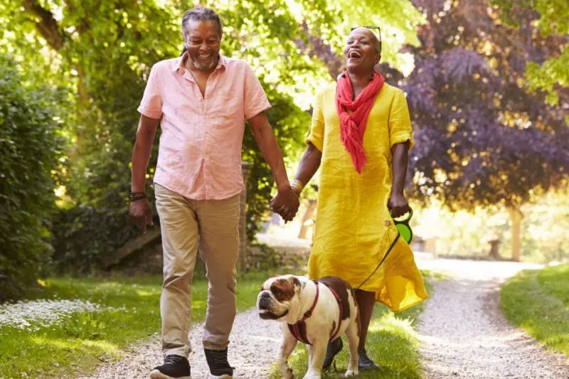 Couple walking the dog