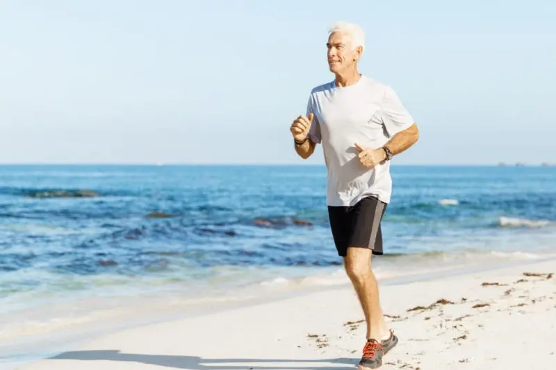 Man running on beach